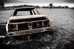 Burned Out Car On Field